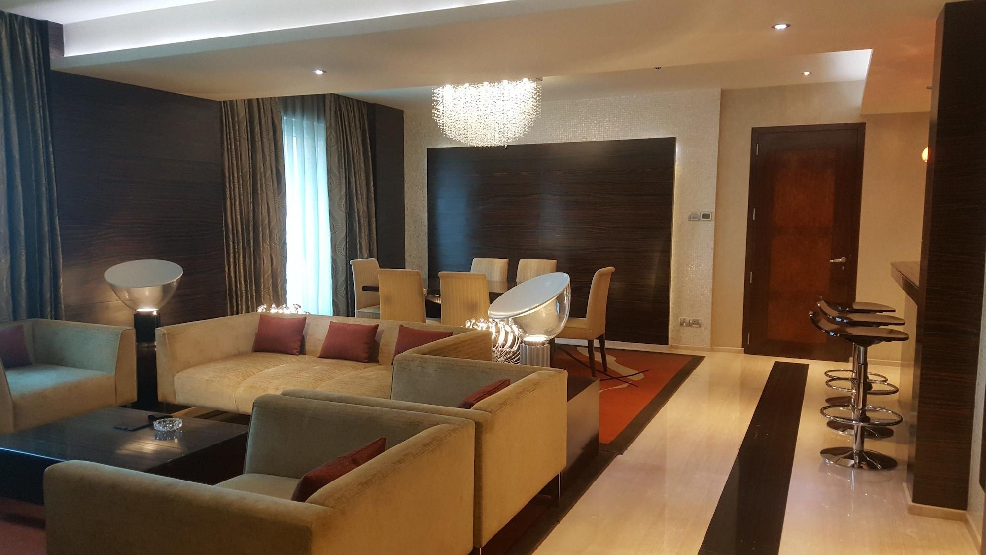 Vivanta Hyderabad, Begumpet Exterior foto A living room in a suite at the Ritz-Carlton, DIFC